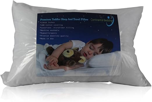 can a 2 year old sleep with a pillow