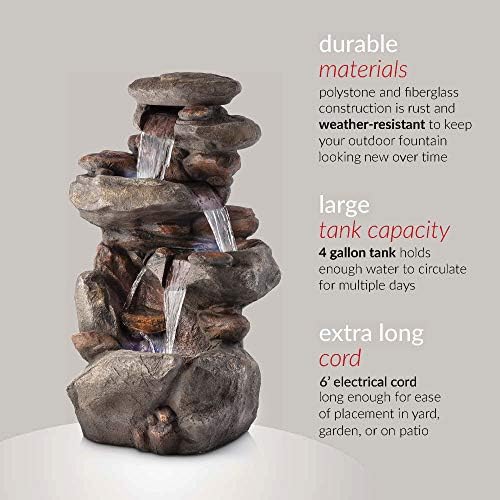 Backyard water fountain with doors setting, pump, and flowing water.