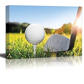 Golf Ball on White Tee and Golf Club...