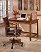 Ashley Furniture Signature Design - Cross Island Swivel Desk Chair - Casters - Casual - Medium Brown Finish - Brown Faux Leather