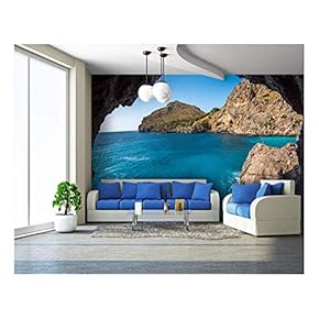 Seashore in The View of Rock Cave - Removable Wall Mural | Self-Adhesive Large Wallpaper - 66x96 inches