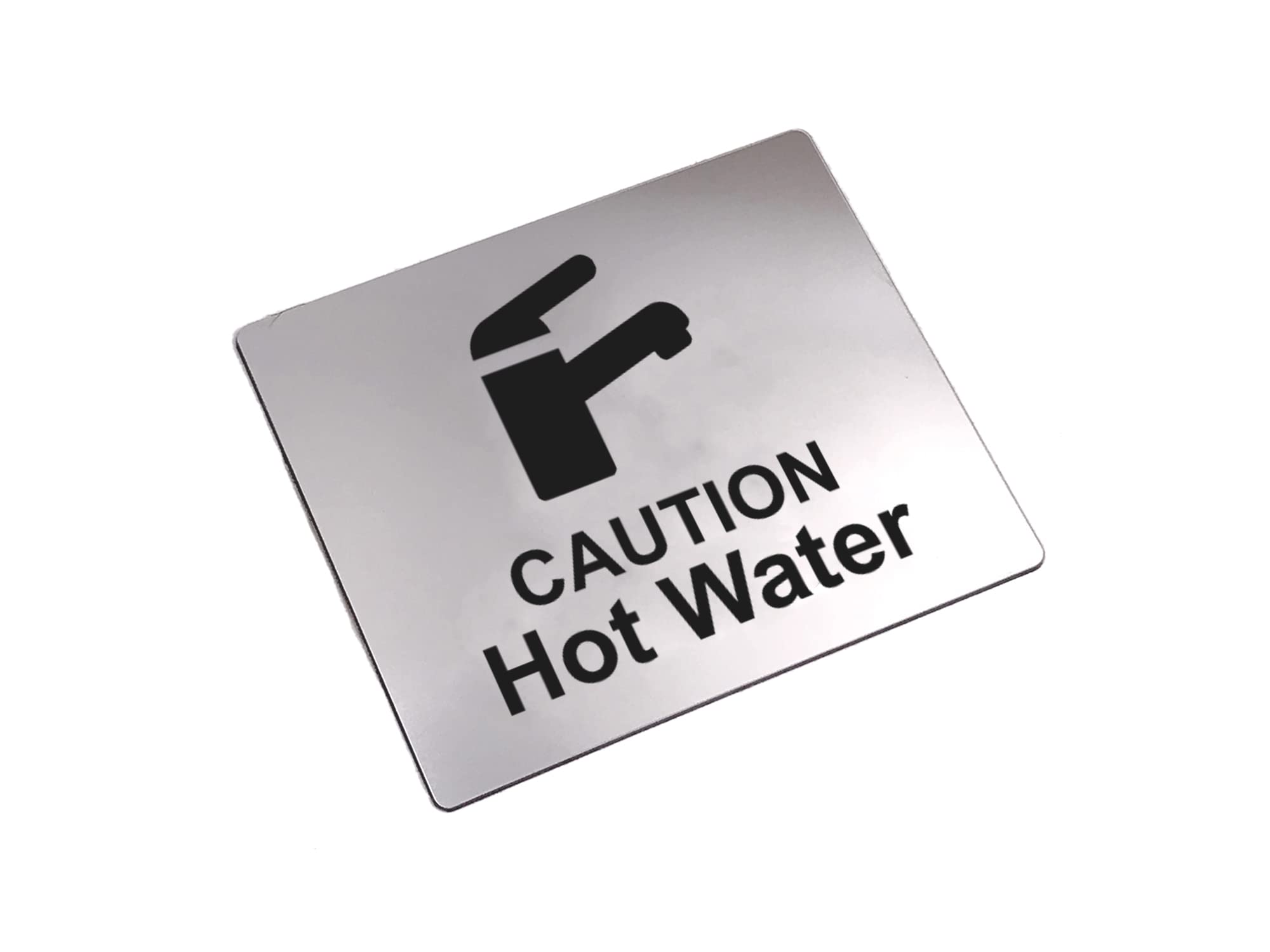 Caution Hot Water Tap Sink Sign with Adhesive Sticker Backing, Metallic Silver Engraved Black with Universal Icon Symbol and Text. Self Adhesive Safety Signs. (Size 12 cm x 10 cm)