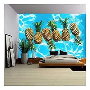 Healthy Raw Organic Food. Fresh Ripe Pineapples Floating in Pure Water in Swimming Pool. - Removable Wall Mural | Self-Adhesive Large Wallpaper - 66x96 inches