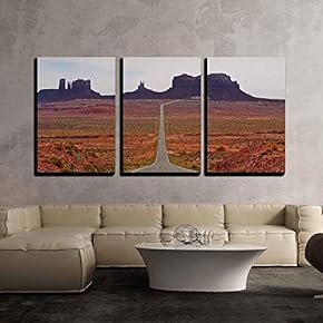 a Straight Desert Road Through The Monument Valley...