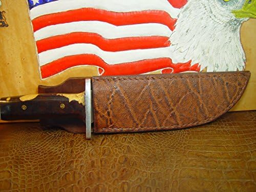 Custom-made Vertical Right hand carry Knife Sheath for the Buck 124 Knife dyed in dark brown. It is made of 10 oz Elephant print leather.