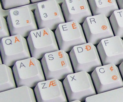 ENGLISH US INTERNATIONAL KEYBOARD STICKERS WITH ORANGE LETTERING ON TRANSPARENT BACKGROUND
