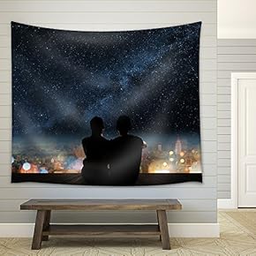 Silhouette of Young Asian Couple Sit on Wooden Ground Above The City Under Stars. - Fabric Wall Tapestry Home Decor - 51x60 inches