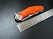 Eafengrow Dark Folding Knives D2 Blade Plating Titanium Steel Handle Flipper Camping Outdoor Tactical Knife EDC Tool (orange)