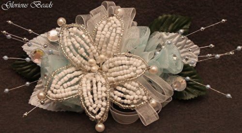 Light Blue and white BEADED lily wrist Corsage with roses, beads, and rhinestones. Also sold with matching boutonniere. Other colors offered in my Amazon store!