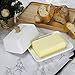 Butter Dish with Lid - Dowan 5.5 Inch Butter Keeper For Counter, Making Spreading Effortless - No-Slip Lid with Handle - Holds 1 Standard Stick - Polished Ceramic Butter Holder in White