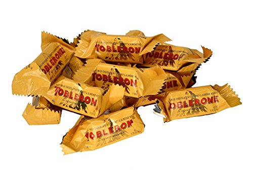 Toblerone New Mini Milk Chocolate Bars - Individually Wrapped - Famous Triangle Chocolate with Honey and Almond Nougat (8 Ounces)