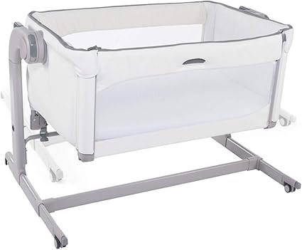 newborn rolling to side in bassinet