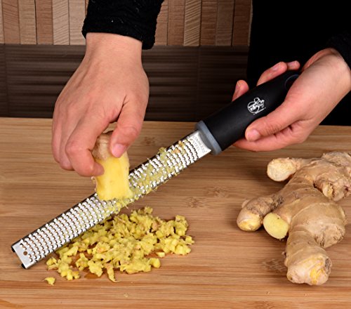 Stainless Steel Citrus Zester & Hand Safe Guard – Lemon, Orange & Lime Grater With Silicone Handle, Cover & A Finger Protector – Grate Cheese, Chocolate, Ginger, Garlic, Coconut, Onions & Potatoes