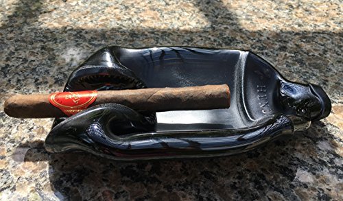 Hendrick's Gin bottle - gently slumped into a bowl or ash tray (great for cigars!)