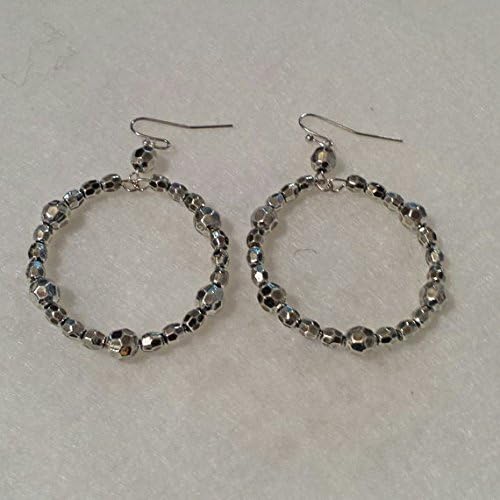 Hoop earrings. Faceted metalized acrylic beads on memory wire. 1 1/2 inch diameter. Very sparkly. Lightweight. French hook ear wires.