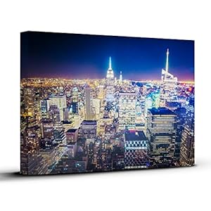 New York City Night Canvas Print. 12 X 16 inch stretched canvas frame featuring the Empire State Building and One World Trade Center. The perfect fine art addition to your home or office decor