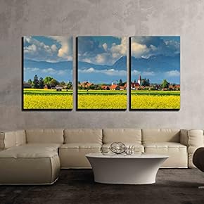 3 Piece Canvas Wall Art - Spectacular Village with Canola Field and Cloudy Mountains in Background - Modern Home Art Stretched and Framed Ready to Hang - 16"x24"x3 Panels
