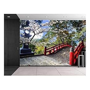 BRAND_NAMELight Post Next to a Red Bridge on...