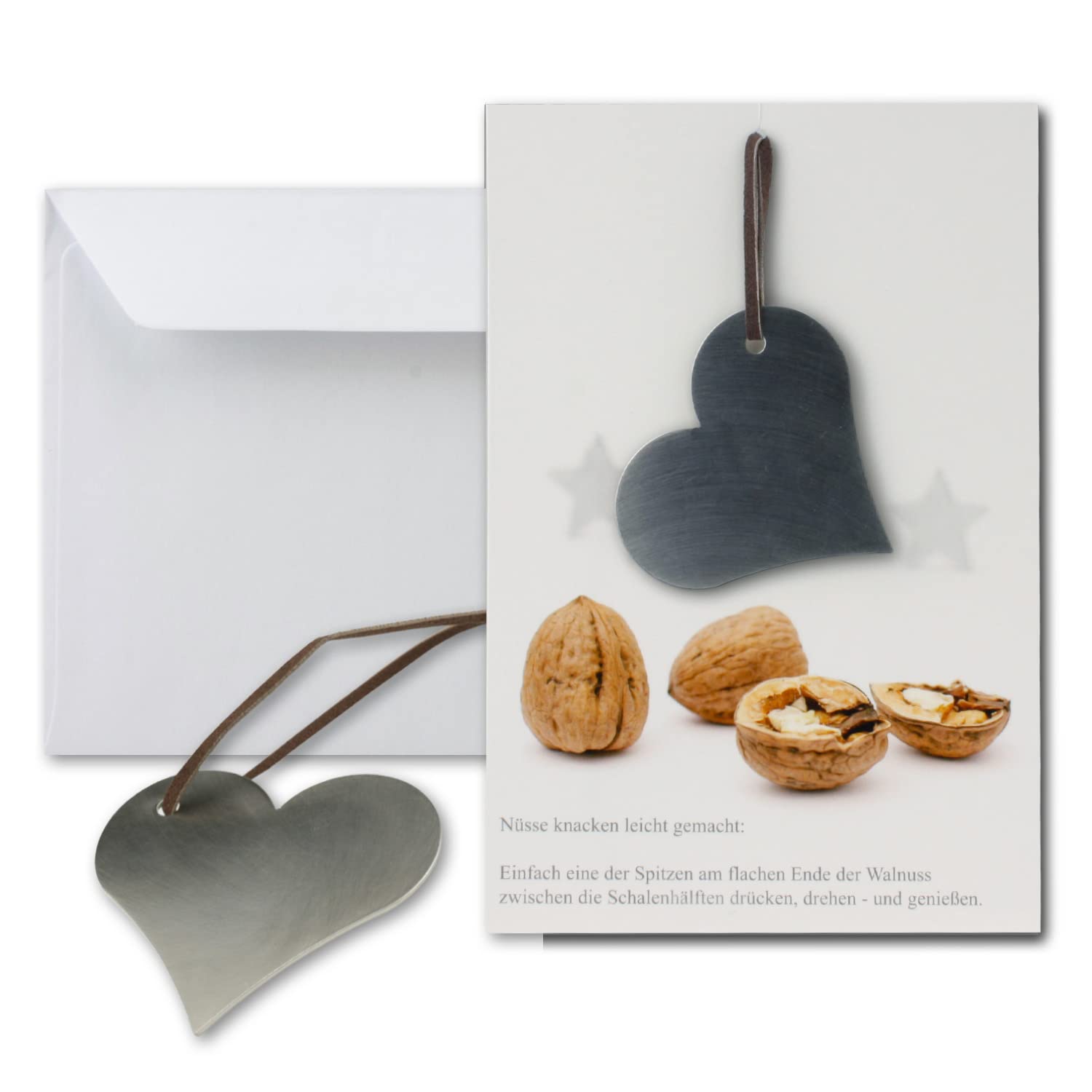Greeting card with real stainless steel nutcracker heart shape and leather strap including envelope in natural white format DIN B6