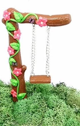 Fairy garden accessories Miniature fairy garden swing with pink flowers.
