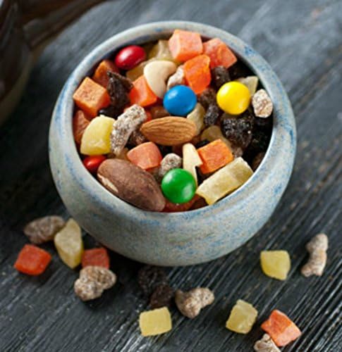 Trail Mix A mix of raisins, dates, diced pineapple and papaya, chocolate buttons, cashews, brazil nuts and almonds (Cowboy Trail, 12 oz Pouch)