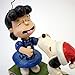 Peanuts by Jim Shore Snoopy Kissing Lucy Mistletoe Stone Resin Figurine, 6.3”