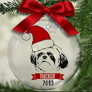 Transparante, vulbare kerstbal met hondje op