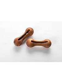 Wooden rattle for baby with jingle-bells. First baby toy