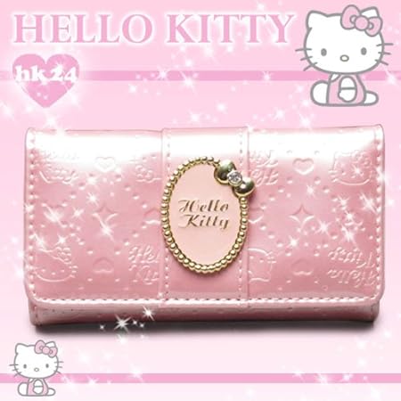 Amazon Co Jp キーケース Kittyロゴ リボン付gブローチ ピンク ハローキティ おもちゃ