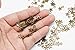 Youkwer 200Pcs 9mm x12mm Antique Alloy Stars Christmas Charms Pendants for DIY Crafting and Jewelry Making(Antique Bronze)