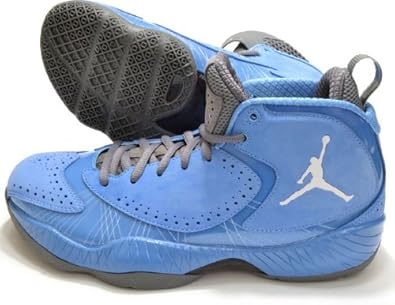 white and dark blue jordans