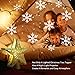 KINGWILL 2-in-1 Gold Glittered 5 Point 9.8 Inch Star Tree Topper with Snowfall LED Lights and Snowflake Projector, Night Light for Christmas Nursery Indoor Decoration