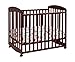 Davinci Alpha Mini Rocking Crib in Rich Cherry, Removable Wheels, Greenguard Gold Certified