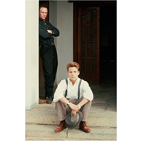 Daniel Craig 8Inch x 10Inch Photo Skyfall Casino Royale The Girl with the Dragon Tattoo Hair Slicked Back Standing Behind Boy Sitting on Steps in White Shirt & Suspenders kn