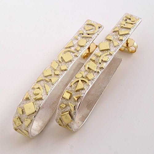 'Fragments'. Dangling earrings in gold and silver