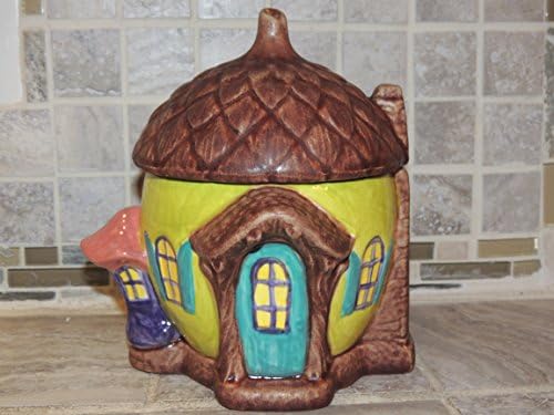 Fairy House Cookie Jar. Food and dishwasher safe. One of a kind. 8 x 6 wide,Food,microwave and dishwasher safe.