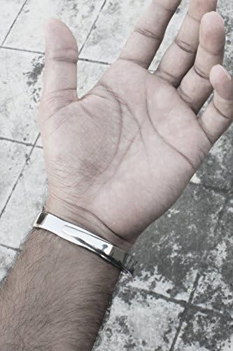 Feel the steel with our "Wrapped Kada Bracelet" on your wrist! Cut from a thick sheet, heated and forged into this shape, it's a sure shot styling hit. FREE Shipping worldwide.
