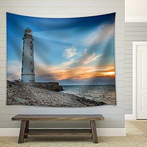 Lighthouse Searchlight Beam Through Sea Air at Night. Seascape at Sunset - Fabric Wall Tapestry Home Decor - 51x60 inches