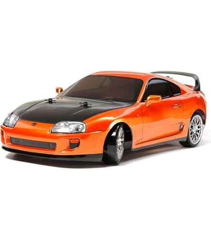 Amazon.com: TAMIYA NISMO R34 GT-R Z-Tune 4 Wheel Drive On Rd TT02D