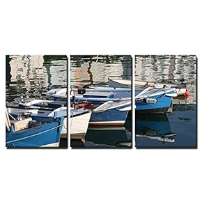 Fishboats Tied Up at The End of The...