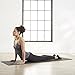 Amazon Basics 1/4-Inch Yoga and Exercise Mat with Carrying Strap, Black