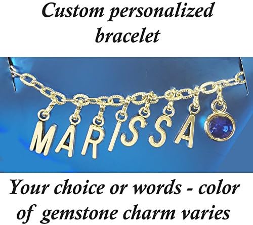 Custom silver charm bracelet by Mossy Cabin - your name or saying.. Price varies from $25-$35 depending on the number of letters and can include numbers. It also comes with a rhinestone charm.
