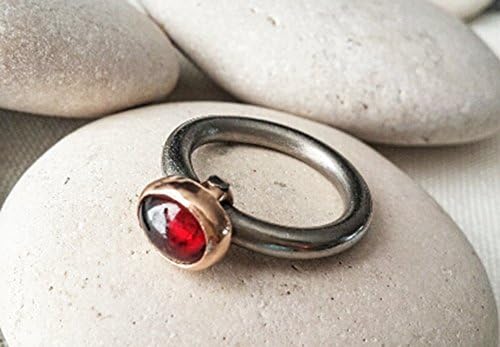 Stackable gold Titanium women`s ring , rose gold ring , red garnet, gold stacking modern , contemporary ring
