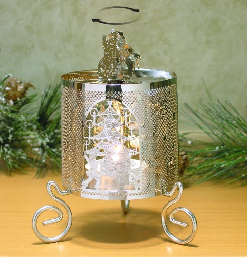 Spinning snowman candle holder with christmas tree scan…