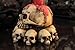 PTC 3.75 Inch Multiple Skulls Hand Painted Resin Candle Holder, Beige