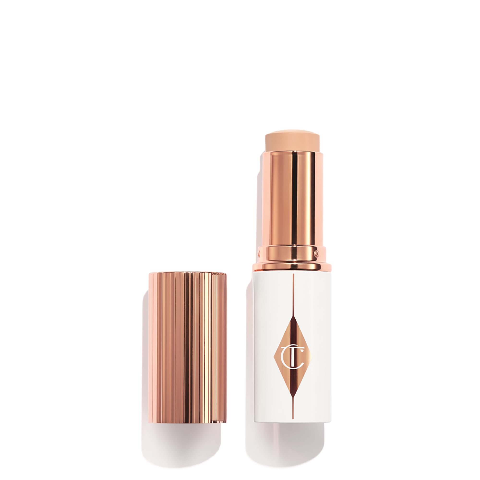 Photo 1 of Charlotte Tilbury Unreal Skin Tint & Sheer Glow Hydrating Foundation Stick - Cream Foundation Makeup with Sheer-to-Light Coverage & a Buildable Formula - Blurring, Smoothing & Nourishing - 2 Fair
