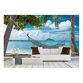 Empty Hammock Between Palm Trees on The Tropical Beach