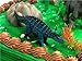 Prehistoric Diplodocus DINOSAUR 12 Piece Birthday CAKE Topper Set Featuring a Diplodocus and 4 Random Dinosaur Figures, Themed Decorative Accessories, Dinosaurs Average 1/2