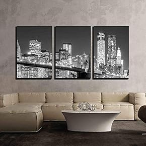 Grayscale Photograph of The Brooklyn Bridge Looking Over...