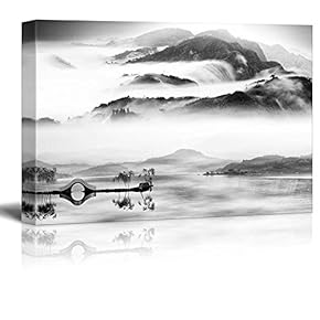 Black and White Bridge Over a Lake with a Foggy Mountain View - Canvas Art Home Art - 12x18 inches